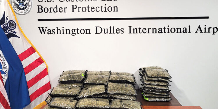 2 men arrested after over 70 pounds of marijuana found in suitcases at Dulles Airport