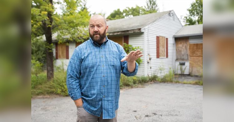 Bruce Spinney III is pictured in September 2019, in front of the property on Worcester Street in Grafton where a business he was seeking to open a marijuana retail store